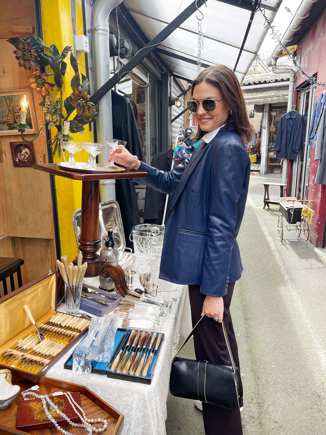 Woman shopping a French flea market